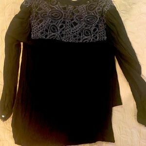 Free people black top with silver.